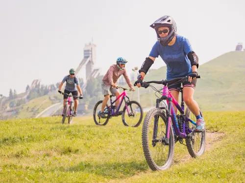 New riders gain confidence mountain biking at WinSport ZenSeekers